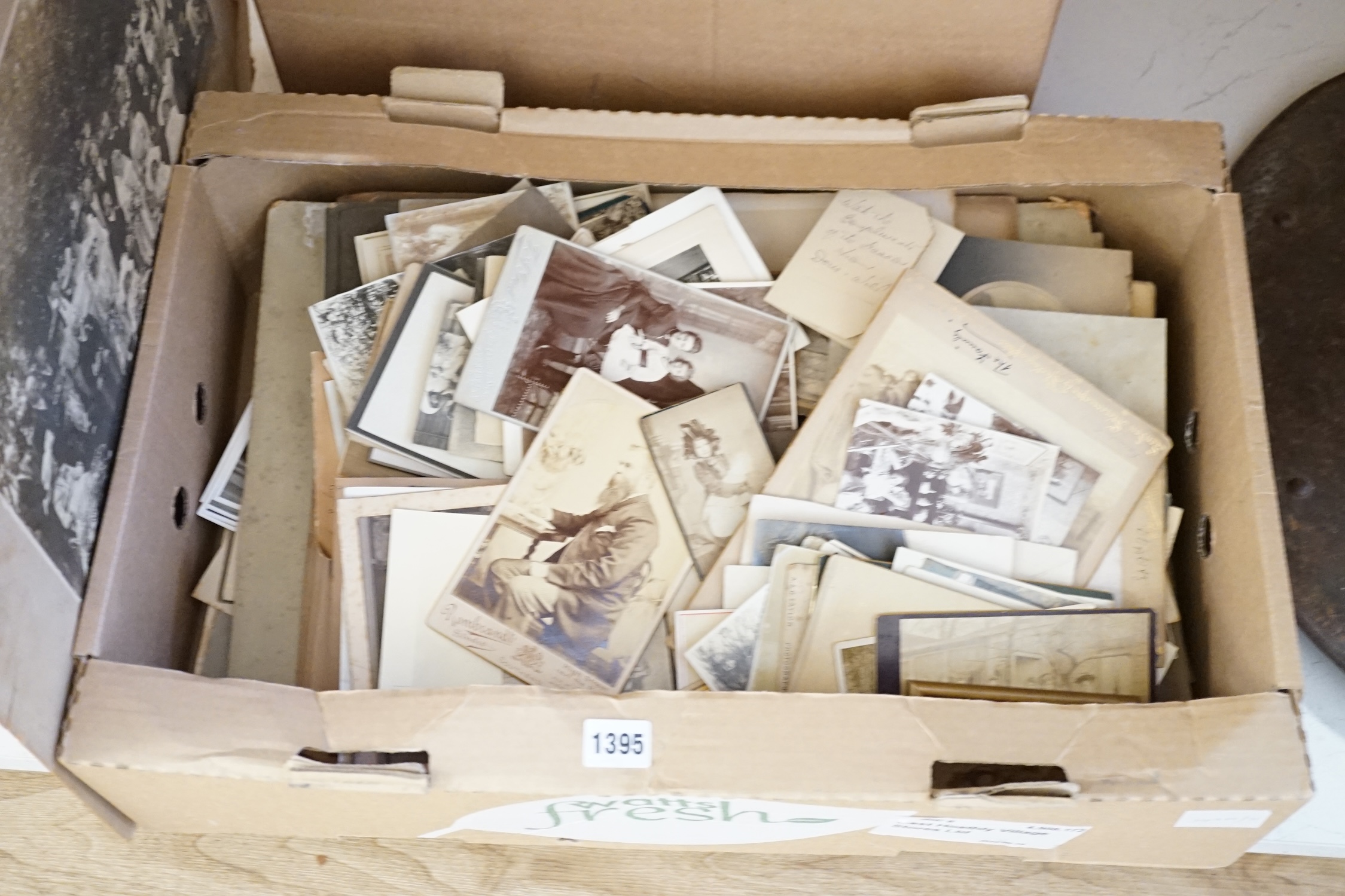 A large collection of 19th and early 20th century black and white wedding photographs together with topographical photos of the era, in three boxes. Condition - fair to good